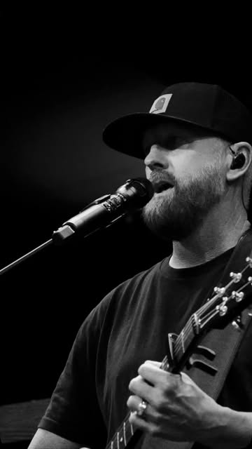 Down for Now vocalist singing into a microphone